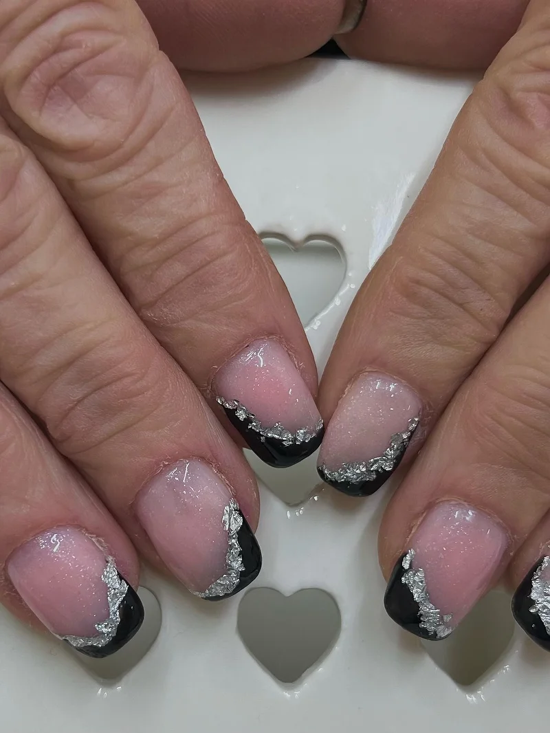 Black French tip nails with silver foil