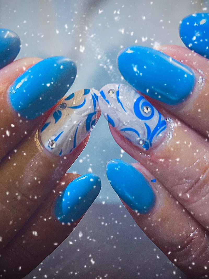 Blue evil eye nails with gem details