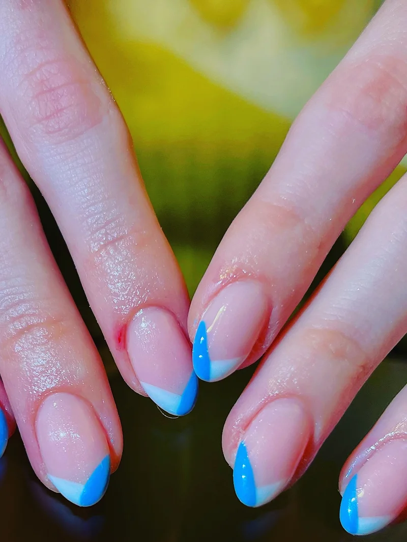 Blue and white French geometric nails