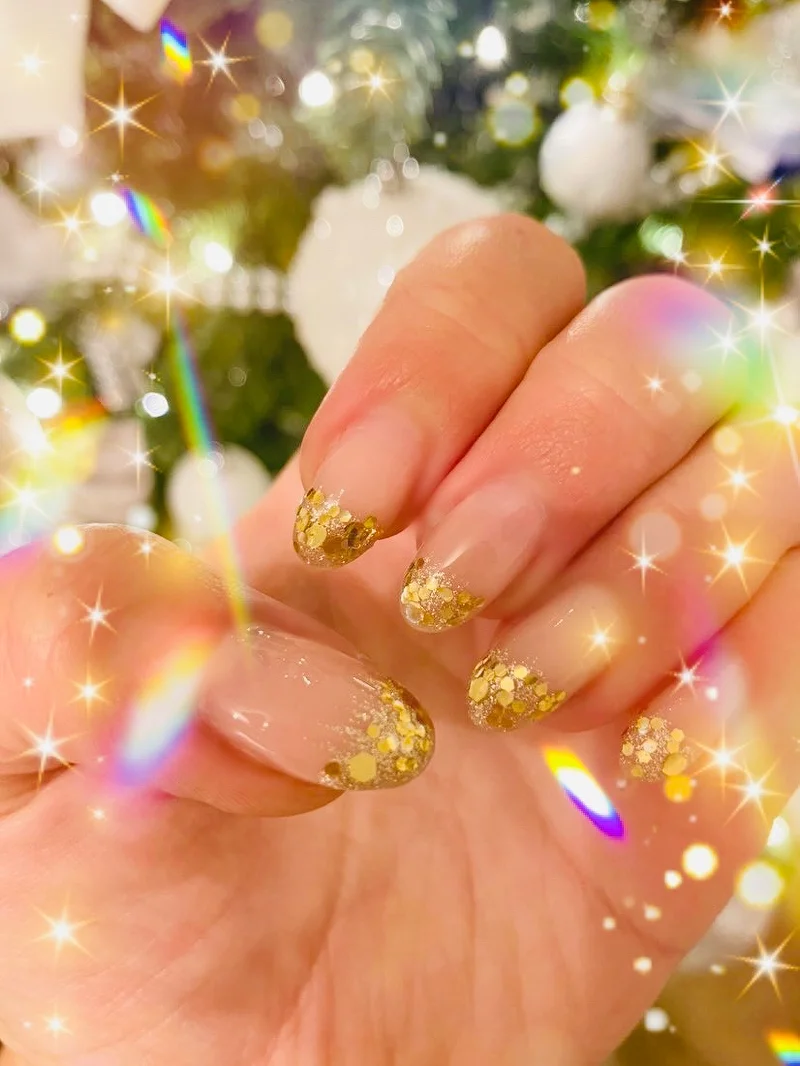 Gold glitter tips with Christmas design
