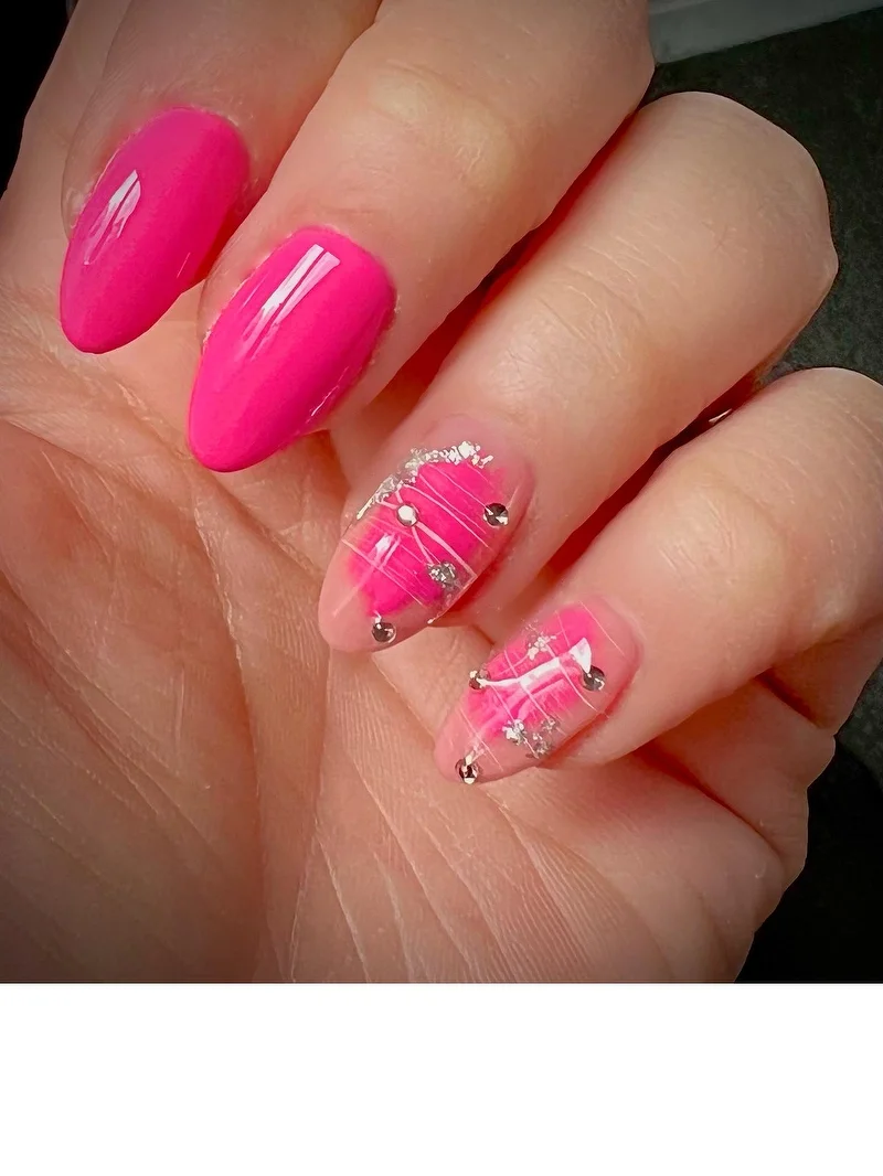 Hot pink marble nails with gem details