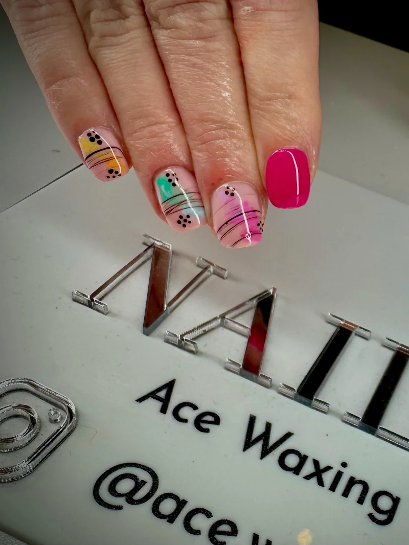 Multicolour dot and line design nails