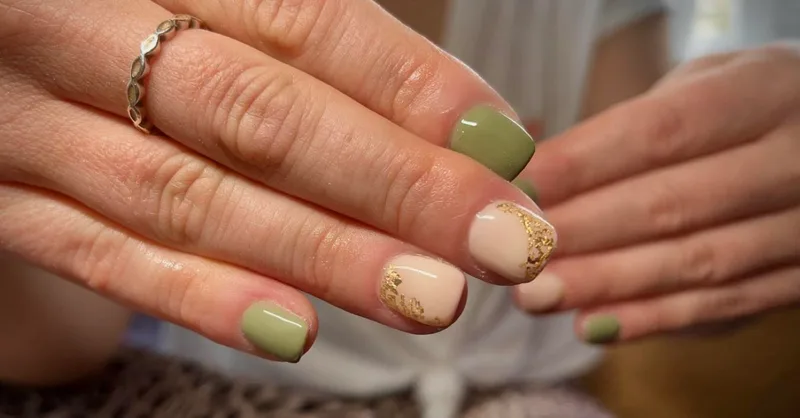 Sage green nails with gold foil accent