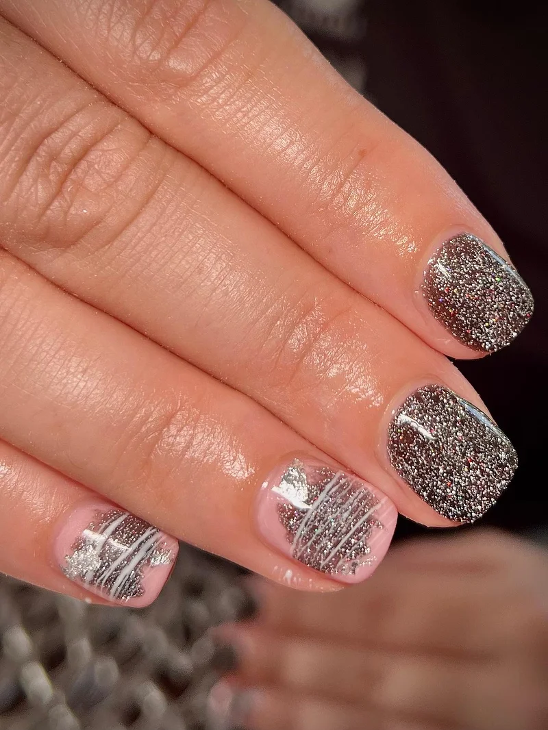 Silver gunmetal glitter nails with spider web detail
