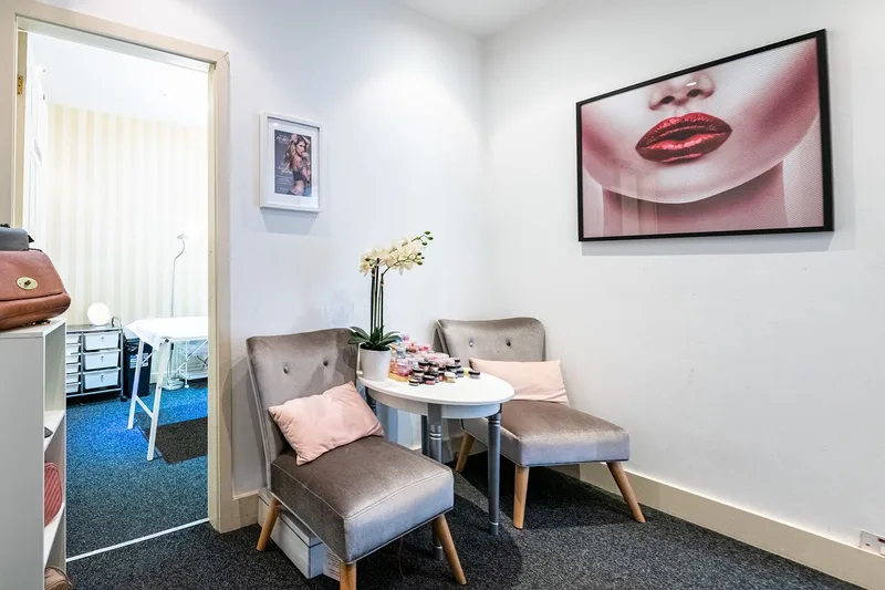 Ace Waxing reception area with velvet chairs